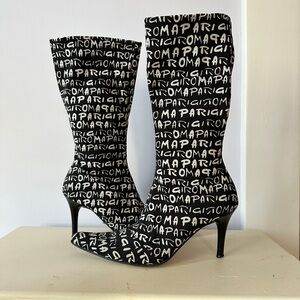 Stylish Black and White Heeled Boots